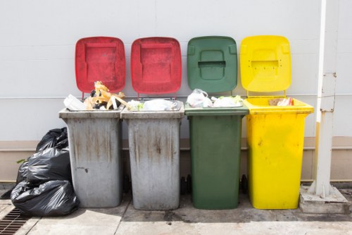 Modern rubbish removal equipment in use